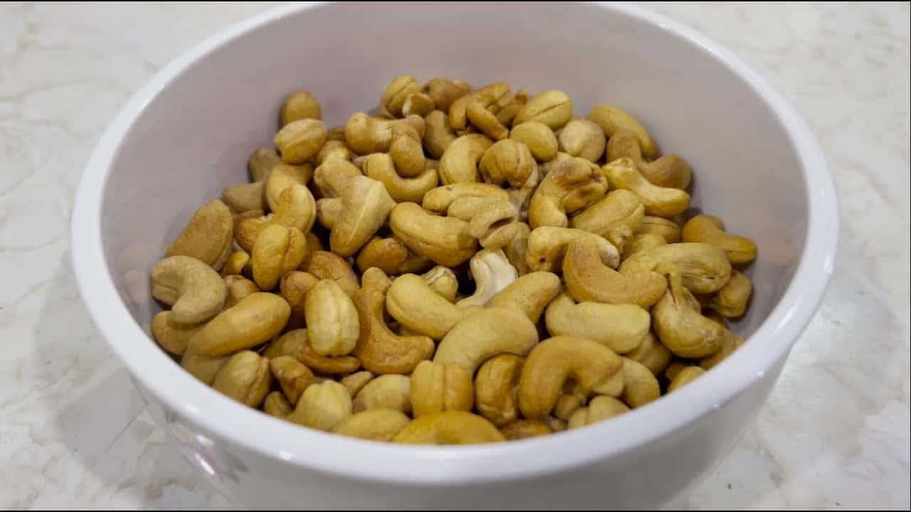 تصویر 3 از بادام هندی برشته زعفرانی درباری و با کیفیت مناسب مصرف روزانه و پذیرایی